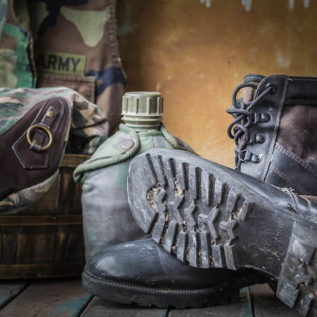 45937212 – boots of soldiers placed on a wooden Facebook Boot Camp