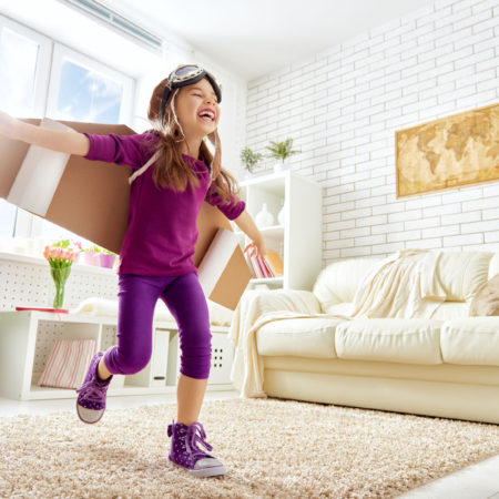 child plays in an astronaut costume Introduction to Your Facebook Business Page
